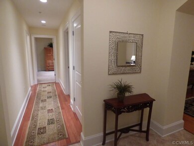 Part of foyer looking down the hall to bedrooms