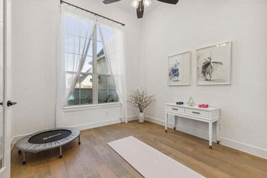 Office being used as yoga room.