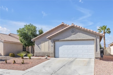 View of front of house featuring a garage, drivewa