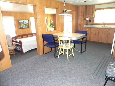 Kitchen looking into living room area