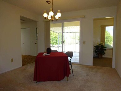 6 DINING RM WITH SLIDING DR TO BACK PATI