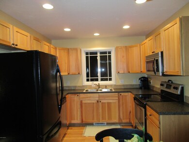 1252 Coopers Pass SW unit 3, Byron Center, MI 49315 - photo 4