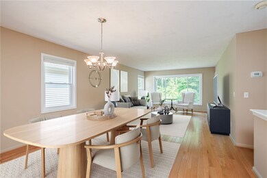 Dining/Living Room with beautiful hardwood floors