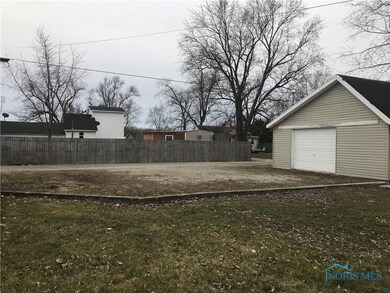 Parking Pad with a 2 Car Garage