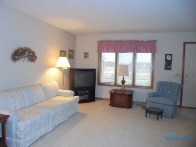 Living room. Please wear shoe coverings provided b