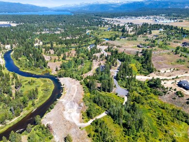View of property location with a water and mountain view