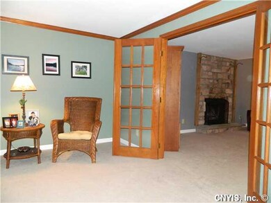 Living Room Living room adjoins family room with c