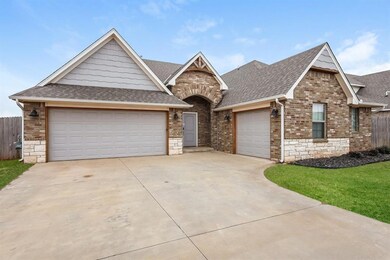 View of front of property with an attached garage,