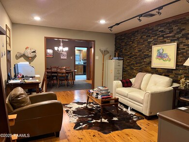 front living area view to kitchen and di