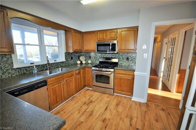 Updated Kitchen with new countertops, flooring, fixtures & more!