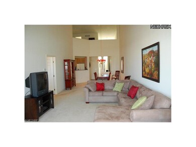 Two story dining and great room open to kitchen an