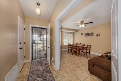 Entry and dining/den/office with double doors