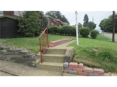 Exterior Front. Stairsfrom driveway to front door