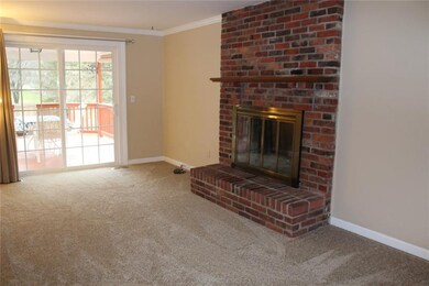 The log burning fireplace in the first floor famil