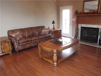 Living Room has a propane gas log fireplace