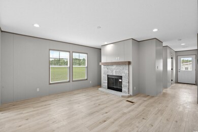 Unfurnished living room featuring ornamental moldi