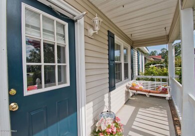 Inviting Front Entry Porch with swing