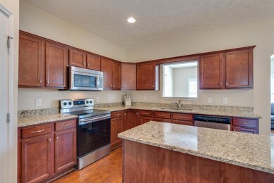 Lots of counter space and cabinets.  Opening looks in to the Florida room.