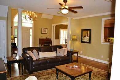 Spacious Living Room With a Fireplace.
