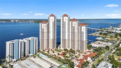 Drone / aerial view of a notable bridge and a large body of water