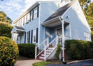 Side porch with separate entrance from paved drive