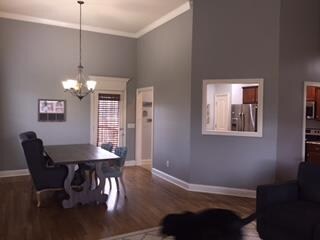 Nice dining area open to the living room, next to the kitchen with pass thru 