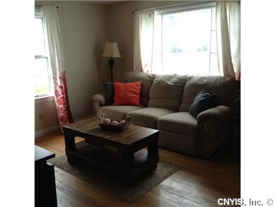 Living Room Large living room with beautiful hardw
