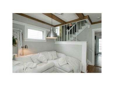 Living Room-L1. Exposed wood beam ceilings through