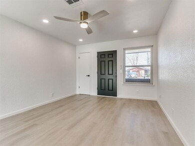 Unfurnished room featuring light wood-type floorin