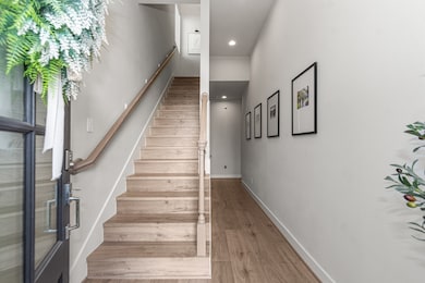 Welcoming entry with clean lines and natural light that sets the tone for modern living.