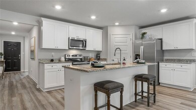 Images are of model home and may include custom design features not available in other homes. [Furnishings and decorative items are not included with home purchase.]