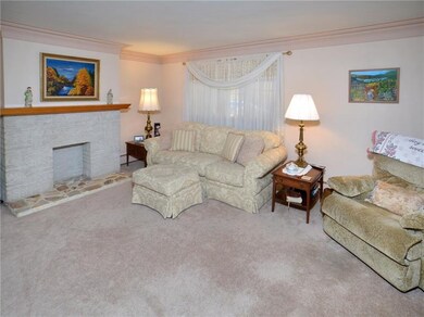 Living room features  decorative fireplace mantle 