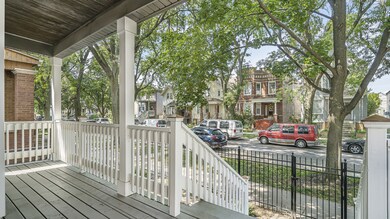 The Covered Front Porch welcomes you in to Spaciou