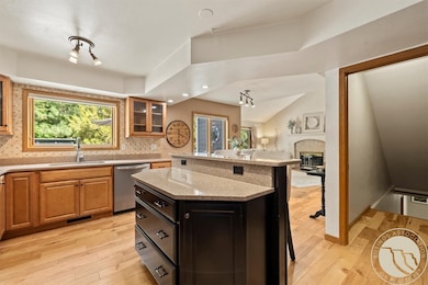 Open to dining space and living room.