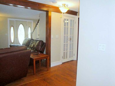 Living Room. French doors to lower level.