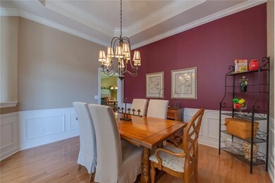 Formal dining - 10' ceilings w/crown and wainscot.