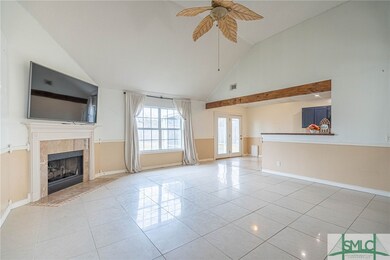 OPEN CONCEPT GREAT ROOM WITH GAS FIREPLACE AND CAT