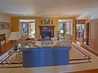 Designed for entertaining, the large den opens to 
