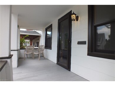 Simply a classic and wonderful full front porch wi