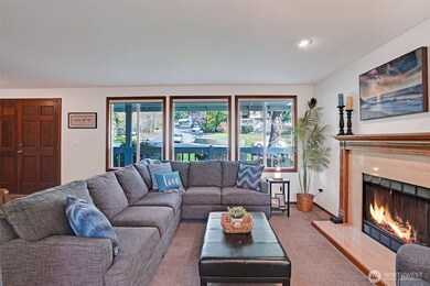 Photographer photoshopped flames in the woodburning fireplace and are not actual. Buyer needs to stay aware of municipality seasonal fire bans.