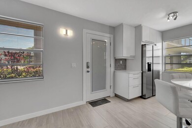 164 Normandy D, Delray Beach, FL 33484 - photo 3