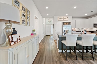 Kitchen featuring stainless steel appliances, a br