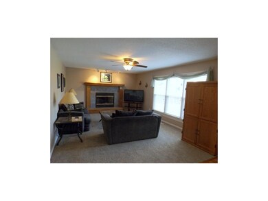 Family room sports lots of natural light and a goo