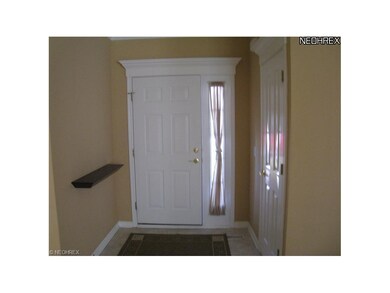 Foyer with guest closet. Take notice of the beauti
