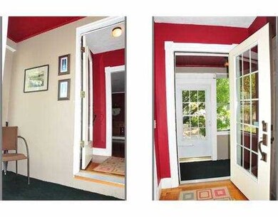 Other. View of enclosed front porch and into entry
