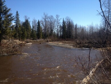 Looking up river at end of property