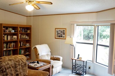 Den has modified bay window