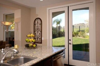 French Doors Open to Backyard