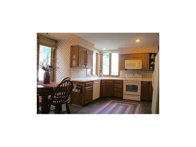 Large eat-in kitchen with lots of windows