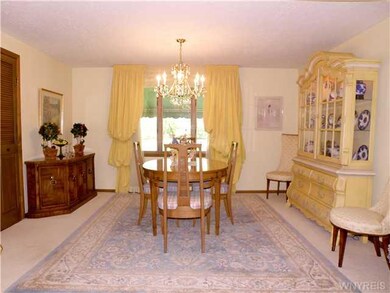Dining Room. Dining room looking over park-like ya